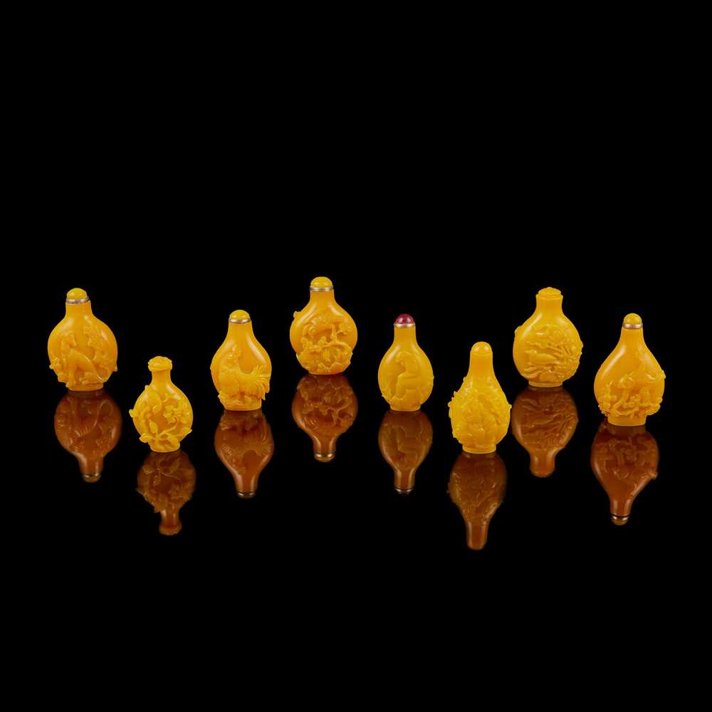 Appraisal: GROUP OF EIGHT YELLOW PEKING GLASS SNUFF BOTTLES QIANLONG MARK