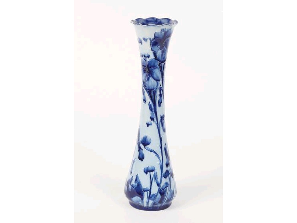 Appraisal: A TALL SLENDER MACINTYRE VASE with shaped rim decorated with