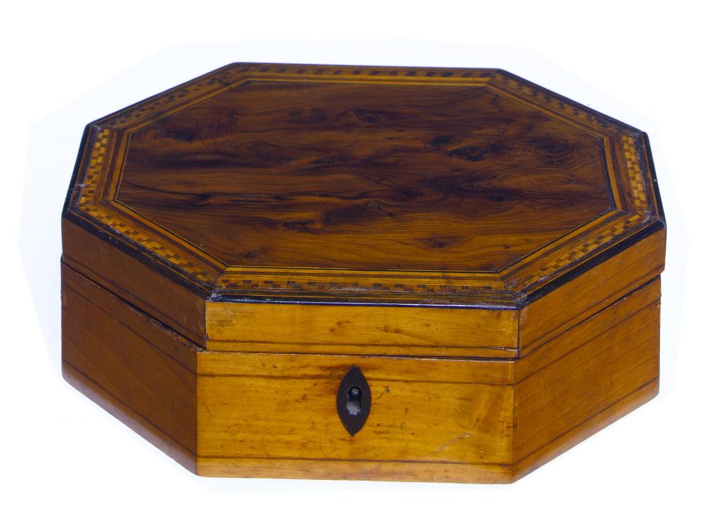 Appraisal: A REGENCY YEW-WOOD SYCAMORE AND PARQUETRY WORK-BOX of octagonal shape