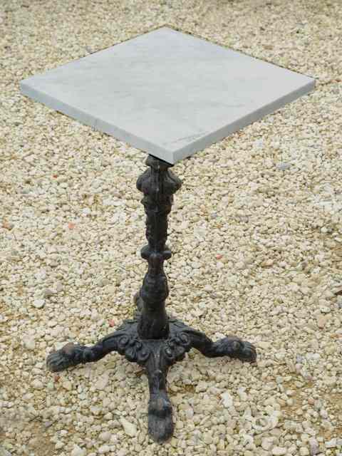 Appraisal: A CAST IRON AND MARBLE TOPPED OCCASIONAL TABLE the square