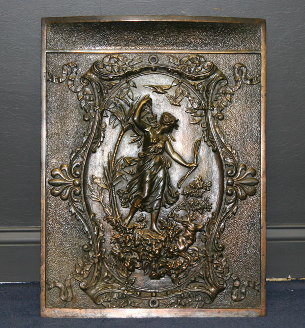 Appraisal: Classically themed cast iron fire screen an embossed Diana the