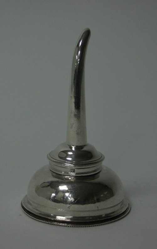 Appraisal: A George III silver wine funnel maker's mark rubbed London