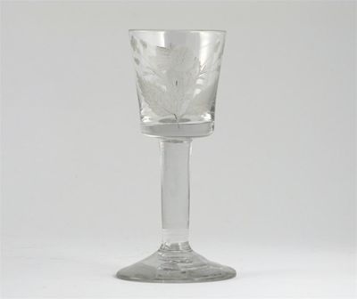 Appraisal: A Jacobite-style wine glass the straight-sided bowl engraved with a