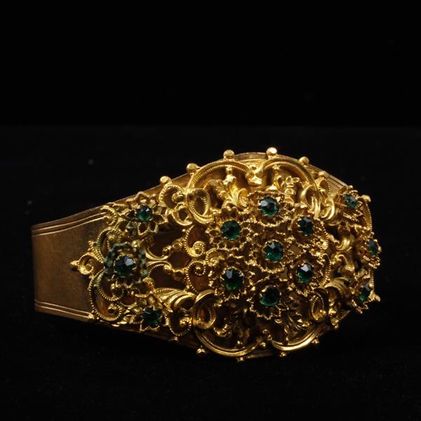 Appraisal: Brass Filigree Gold Tone Bracelet with Emerald Green Rhinestones inner