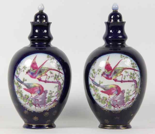 Appraisal: A pair of Vienna porcelain urns circa printed with polychrome