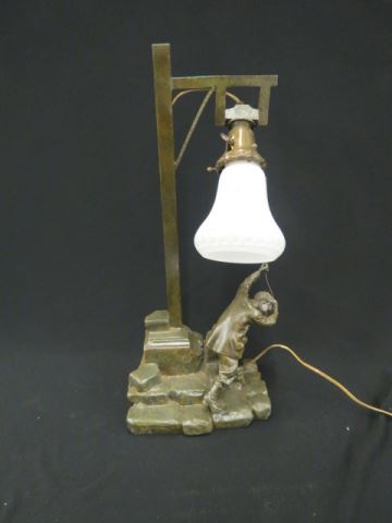 Appraisal: Antique Bronzed Figural Lamp boy ringing a bell art glass