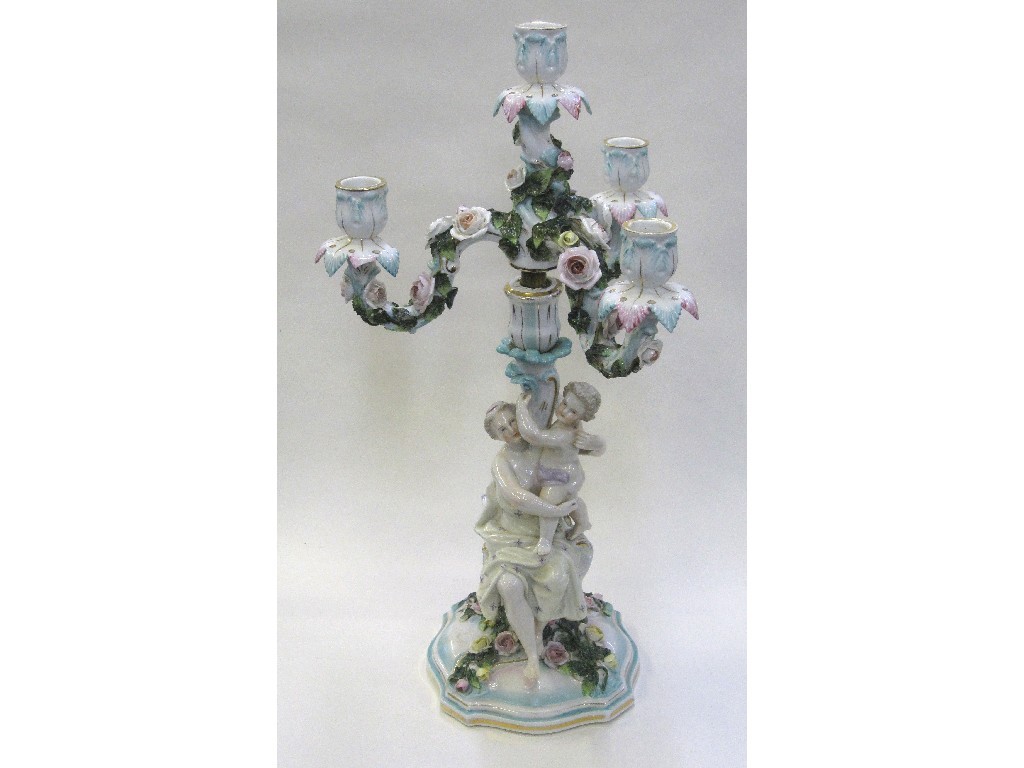 Appraisal: Sitzendorf porcelain candelabra with a seated robed figures and a