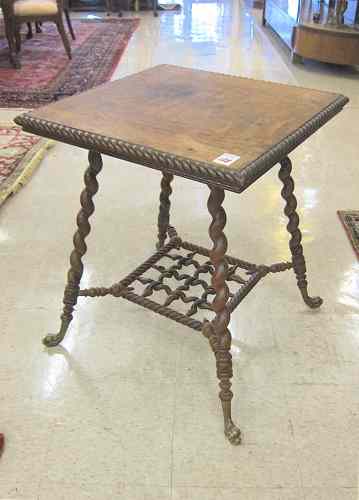 Appraisal: LATE VICTORIAN OAK LAMP TABLE American c having a square