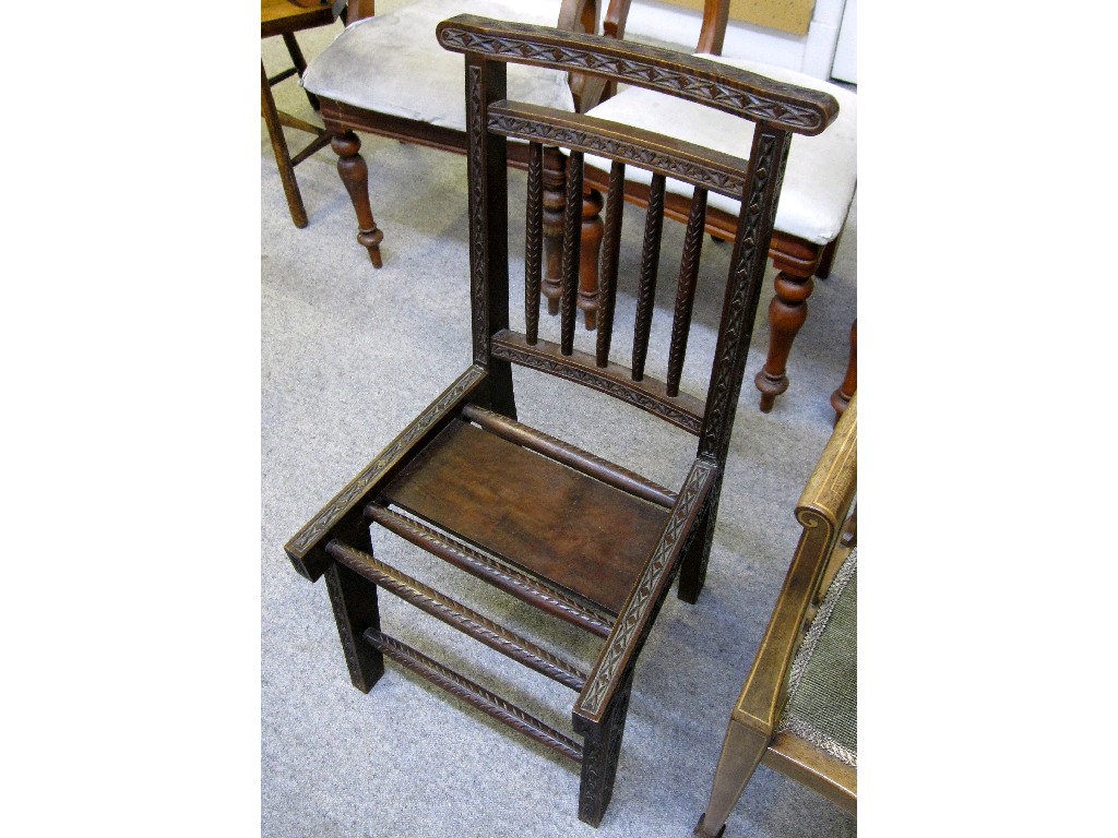 Appraisal: Caithness carved hardwood chair