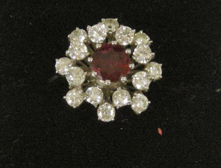 Appraisal: An ct white gold ruby and diamond cluster ring the