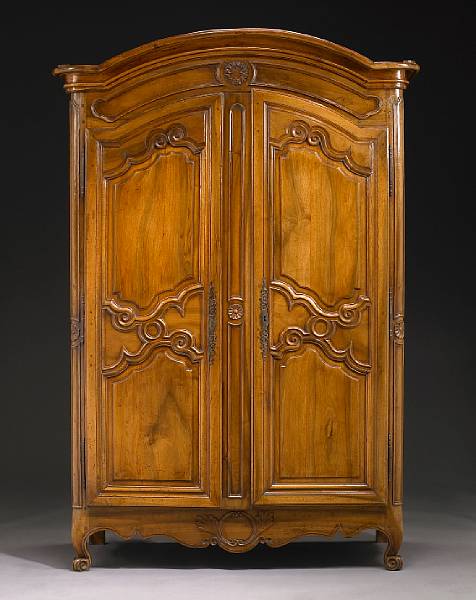 Appraisal: A Louis XV style carved walnut armoire second half th