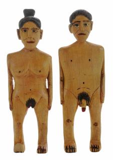 Appraisal: Two Carved Wooden Figures American th century nude man and