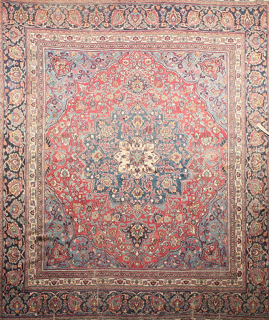 Appraisal: AN OLD PERSIAN COUNTRY HOUSE CARPET with all over foliate