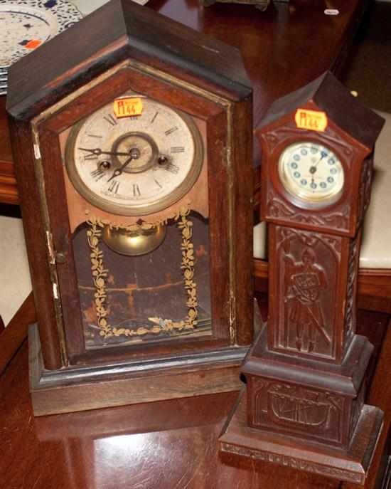 Appraisal: Gothic style carved wood clock and a Victorian rosewood kitchen