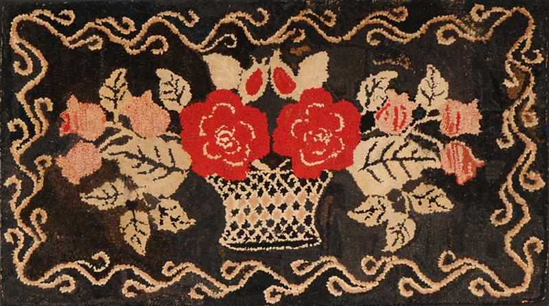 Appraisal: HOOKED RUG Depicting a vase of flowers mounted on stretcher