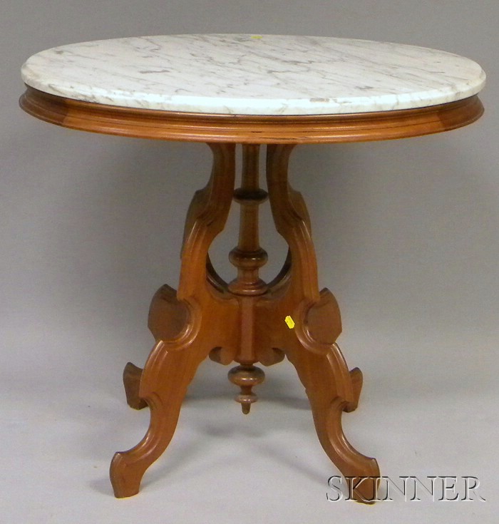 Appraisal: Victorian Oval White Marble-top Carved Walnut Occasional Table