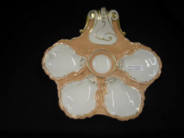 Appraisal: French Victorian Porcelain Oyster Plate handled four port plus sauce