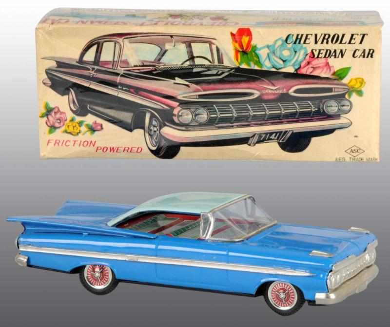 Appraisal: Tin Chevy Impala Friction Toy Description Japanese Working Made by