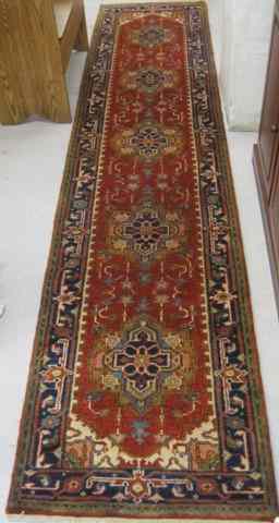 Appraisal: HAND KNOTTED ORIENTAL CORRIDOR RUG Persian Serapi design featuring five