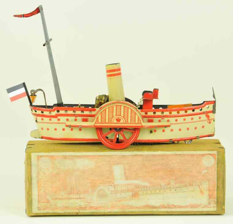 Appraisal: REIL CO PADDLE WHEELER WITH BOX Germany lithographed tin extensive