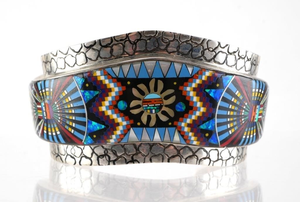 Appraisal: Sterling silver cuff bracelet featuring Native American style multi-colored design