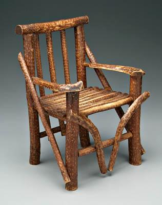 Appraisal: Twig child's armchair chip carved surfaces hickory and or laurel