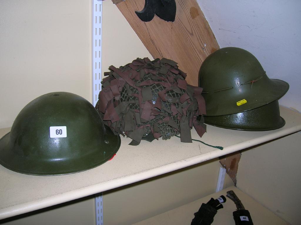 Appraisal: Four British steel helmets Mark II WWII Civil Defence Mark