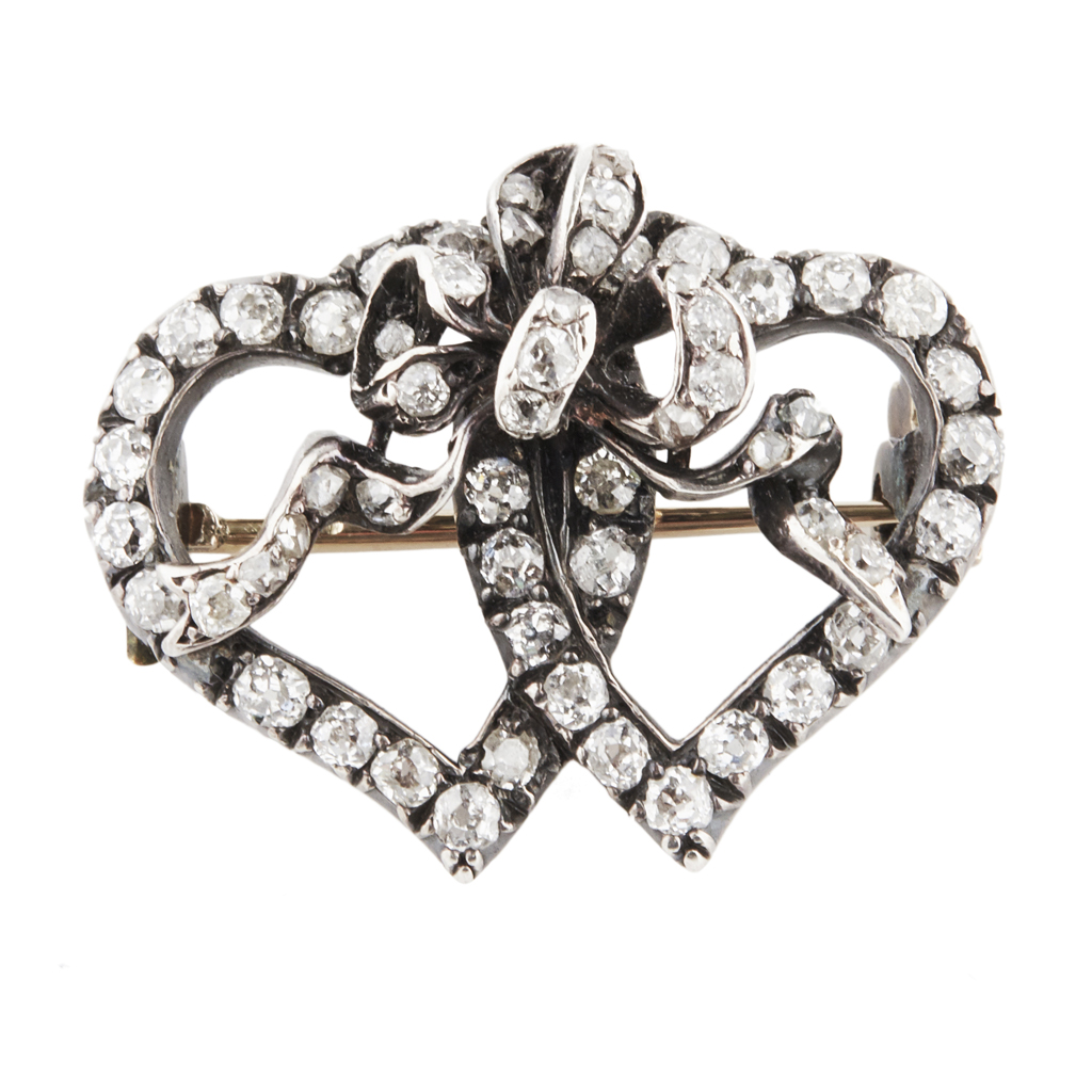 Appraisal: A late Victorian diamond set brooch modelled as two entwined