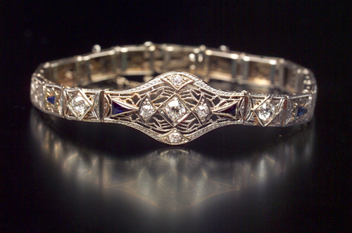 Appraisal: ART DECO Diamond and sapphire filigree bracelet Platinum-topped gold central