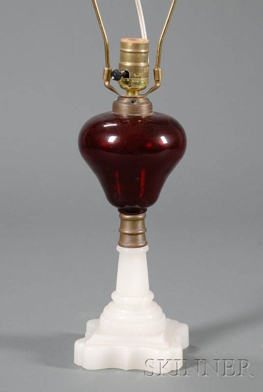 Appraisal: Cranberry and Pressed Clambroth Fluid Lamp late th century transparent