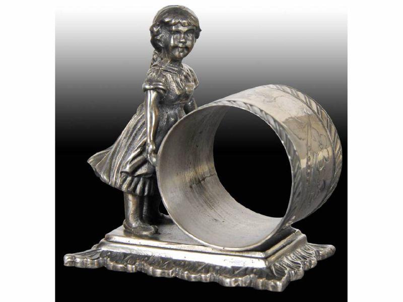 Appraisal: Girl with Long Braid Pushing Figural Napkin Ring Description Marked