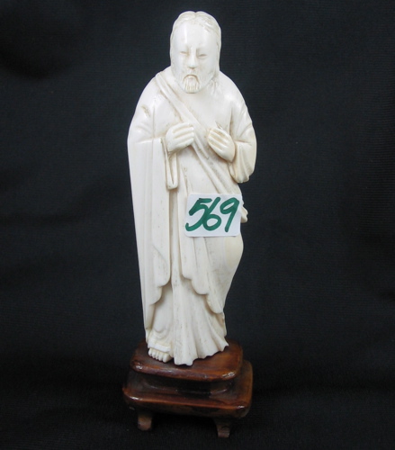 Appraisal: A CHINESE CARVED IVORY FIGURE of a wise old sage