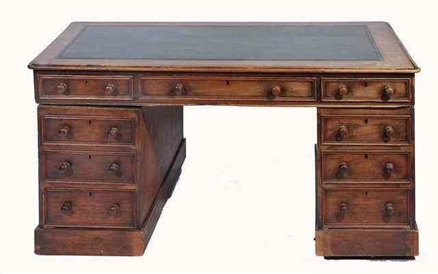 Appraisal: A VICTORIAN MAHOGANY RECTANGULAR PEDESTAL WRITING DESK with green leather