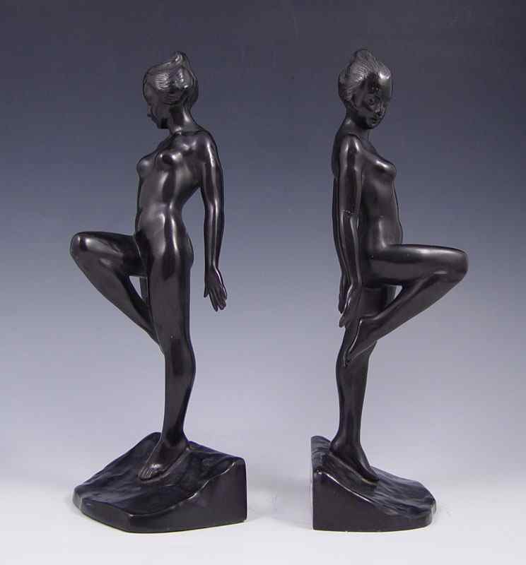 Appraisal: PAIR RONSON ART DECO FIGURAL NUDE BOOKENDS Cast metal glossy