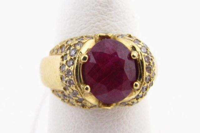 Appraisal: Lady's K yellow gold ring with oval ruby center stone