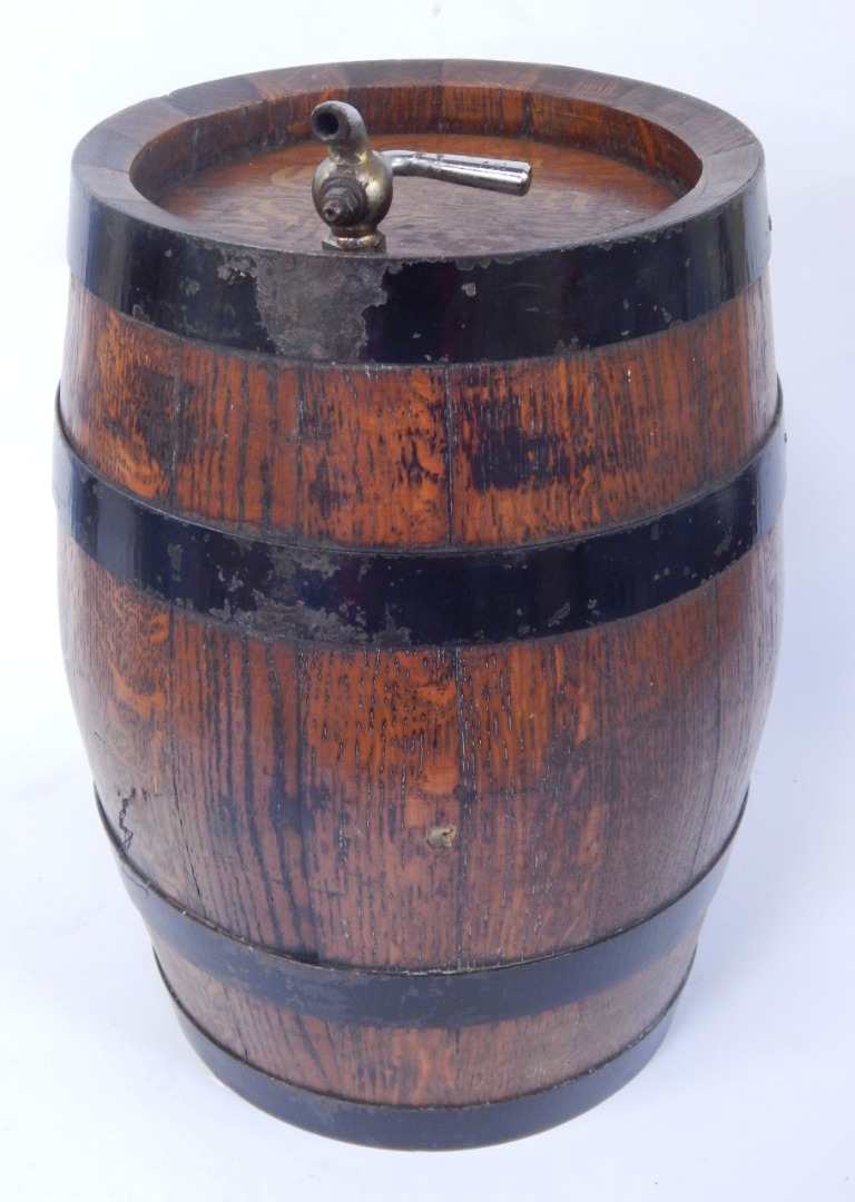 Appraisal: An oak and iron bound barrel cm high and an