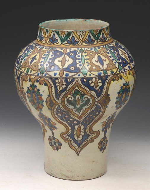 Appraisal: A MOROCCAN LARGE POTTERY BALUSTER VASE with stylistic painted decoration