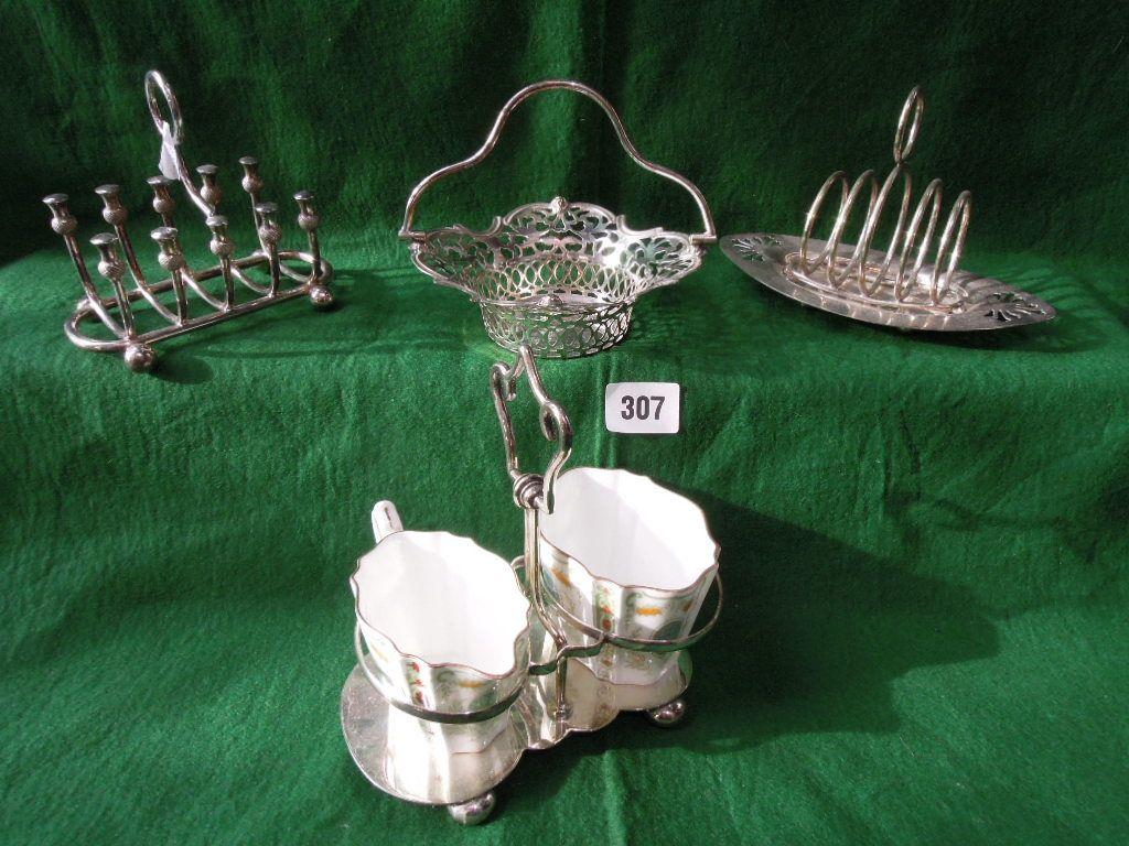 Appraisal: A novelty toast rack together with a pierced basket a