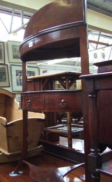 Appraisal: A Regency mahogany corner wash stand the galleried back over