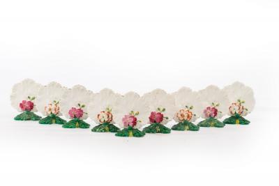 Appraisal: A collection of nine Brownfield leaf-shaped floral menu holders cm