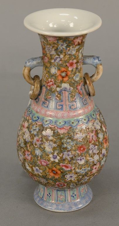 Appraisal: Small Chinese famille rose vase having painted flower and scrolling