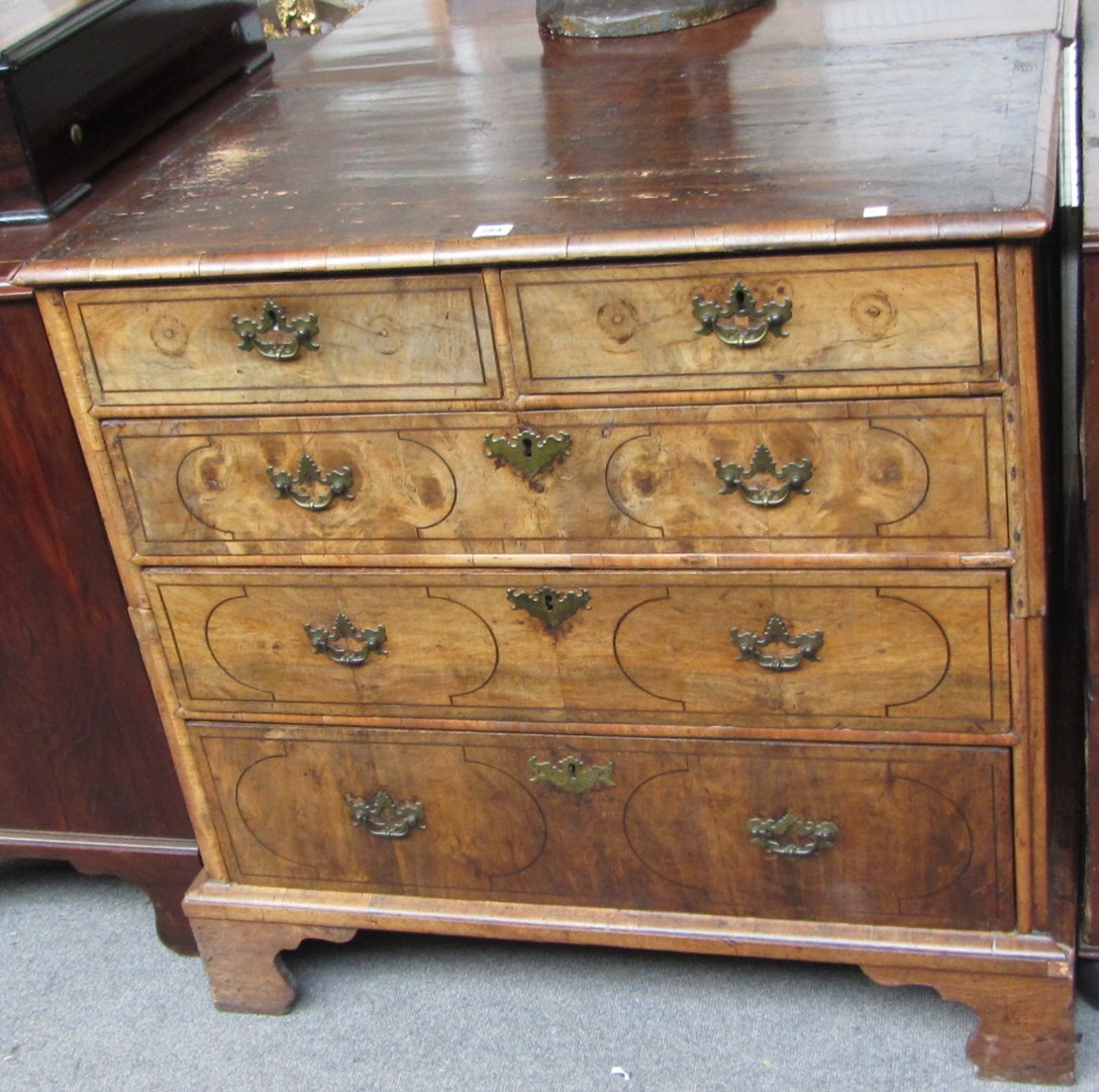 Appraisal: A mid th century inlaid walnut chest of two short