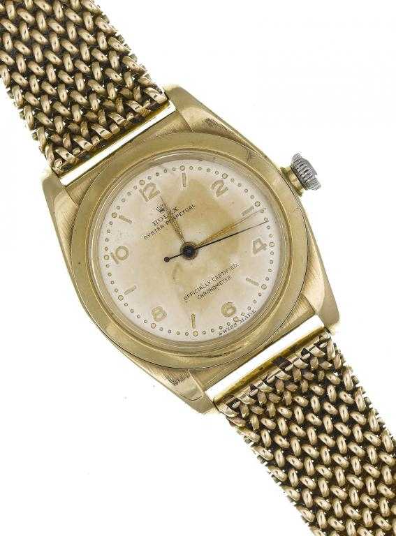 Appraisal: A ROLEX CT GOLD OYSTER PERPETUAL WRISTWATCH movement numbered and