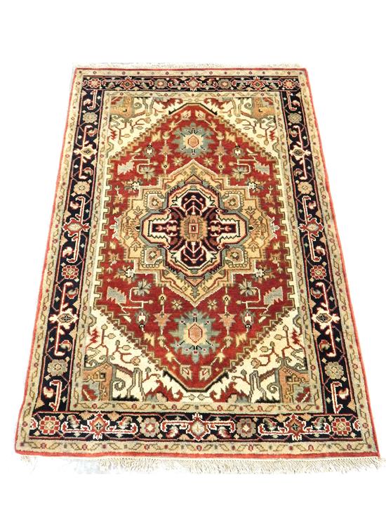 Appraisal: RUG Agra Serapi black central medallion and black border ivory