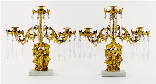 Appraisal: Pair English brass marble and crystal candelabra circa figural stem