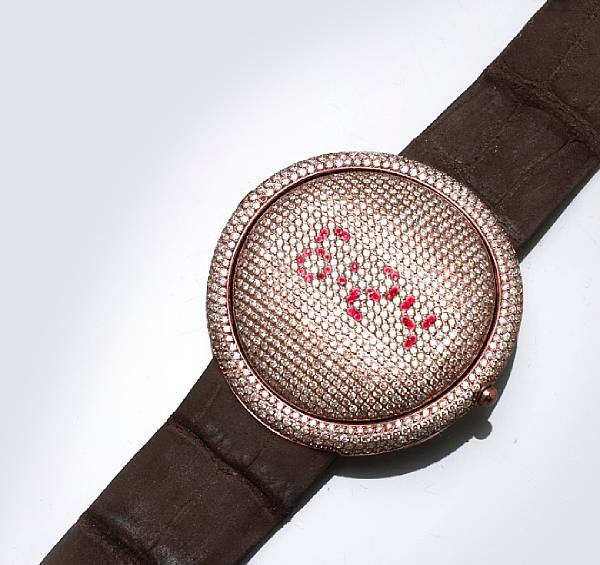 Appraisal: A brown diamond and stainless steel digital wristwatch Christian Tse