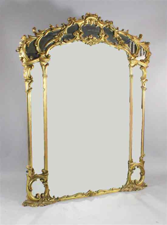 Appraisal: A large Victorian carved giltwood and gesso overmantel mirror decorated