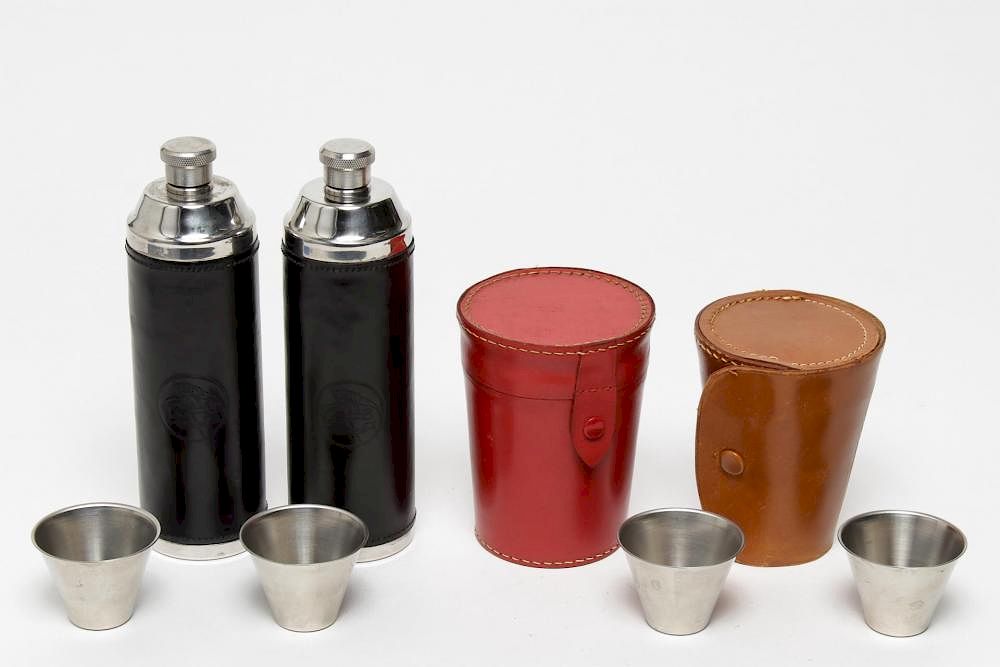 Appraisal: Vintage Leather Cased Flasks Tumblers Vintage leather flasks and tumblers