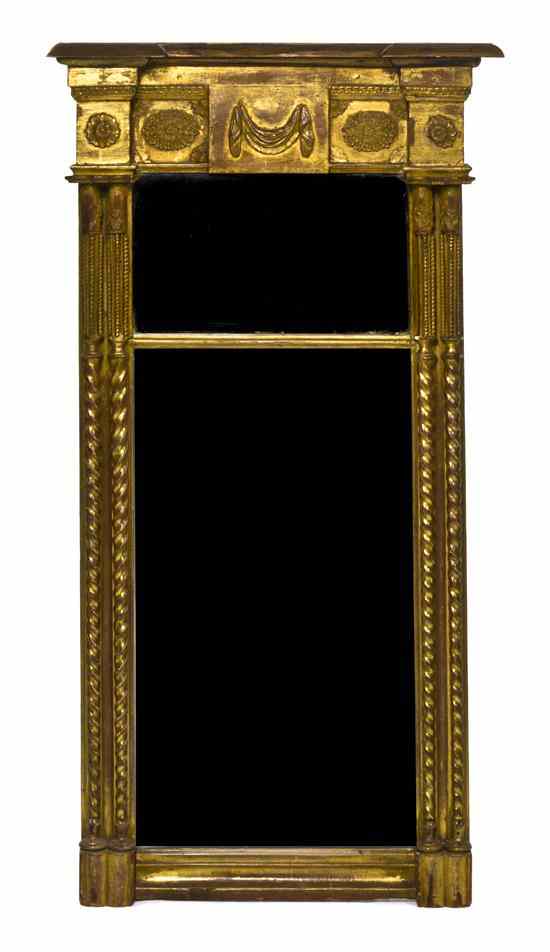 Appraisal: A Neoclassical Giltwood Mirror of blockfront form having swag and