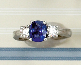 Appraisal: DIAMOND AND SAPPHIRE RING White gold lady's ring set with